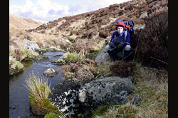 Dunstan and his silly hat by a river