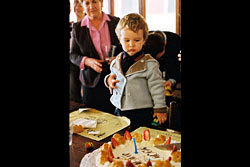 A little boy and a birthday cake